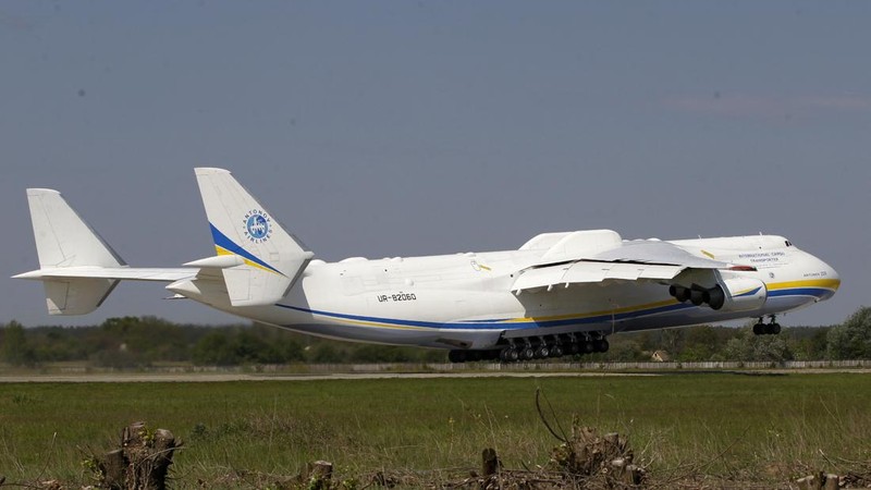 The world's largest airplane, Ukrainian Antonov An-225 Mriya takes off at the  airport  near Hostomel near Kiev , Ukraine, Tuesday, May 10, 2016. The An-225 departed its home base at  Hostomel and flew to Prague, Czech Republic, where it will be loaded with the massive 130-tonne generator and will fly onto Perth, Australia.  (AP Photo/Sergei Chuzavkov)