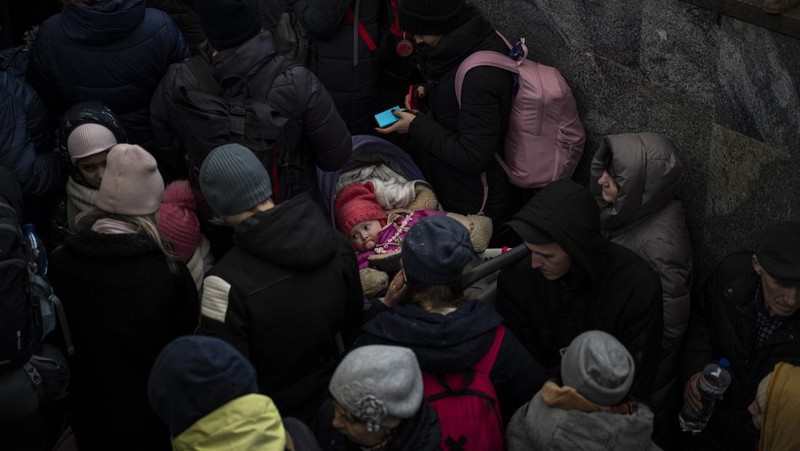 A toy sits among the debris near an apartment building damaged following a rocket attack, in Kyiv, Ukraine, Saturday, Feb. 26, 2022. (AP Photo/Emilio Morenatti)