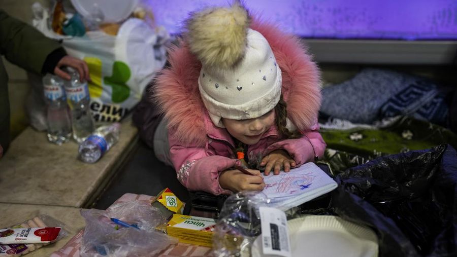 A toy sits among the debris near an apartment building damaged following a rocket attack, in Kyiv, Ukraine, Saturday, Feb. 26, 2022. (AP Photo/Emilio Morenatti)