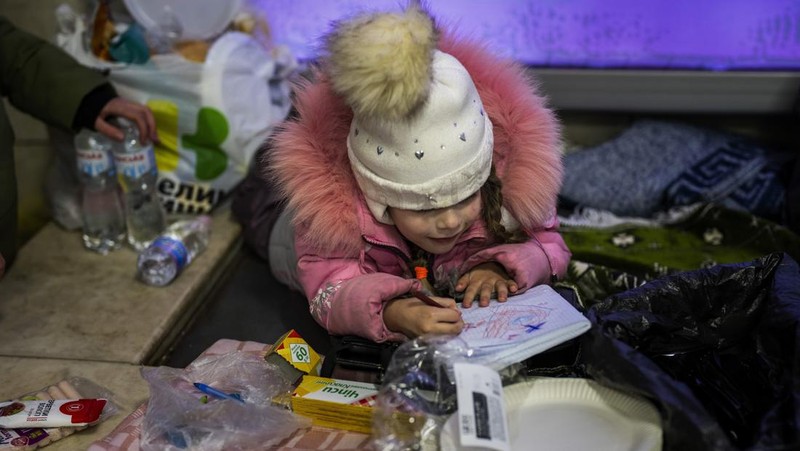 A toy sits among the debris near an apartment building damaged following a rocket attack, in Kyiv, Ukraine, Saturday, Feb. 26, 2022. (AP Photo/Emilio Morenatti)