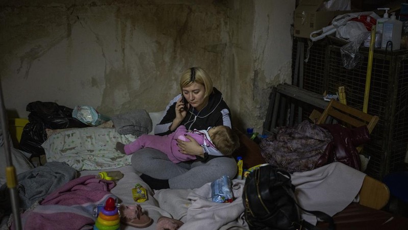 A toy sits among the debris near an apartment building damaged following a rocket attack, in Kyiv, Ukraine, Saturday, Feb. 26, 2022. (AP Photo/Emilio Morenatti)