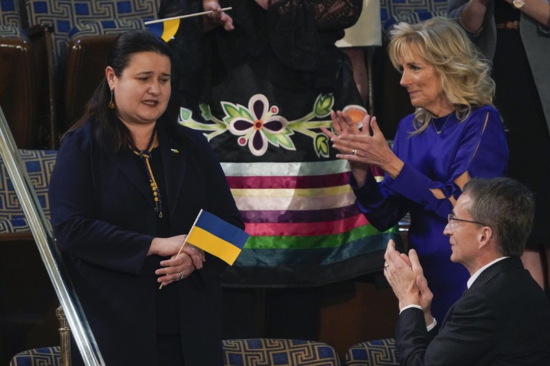 State of the Union Ukraine Ambassador to the United States, Oksana Markarova, acknowledges President Joe Biden as first lady Jill Biden applauds during his first State of the Union address to a joint session of Congress, at the Capitol in Washington, Tuesday, March 1, 2022. Patrick Gelsinger, CEO of Intel, is at front right. (AP Photo/J. Scott Applewhite, Pool)