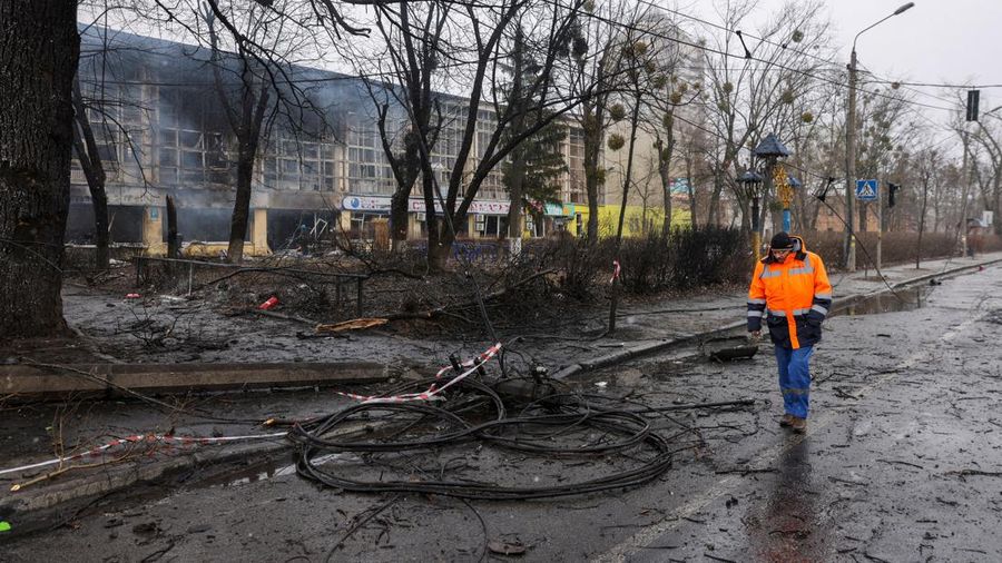 A man walks through the site of yesterday's blast targeted at the TV tower, as Russia's invasion of Ukraine continues, in Kyiv, Ukraine March 2, 2022. REUTERS/Umit Bektas