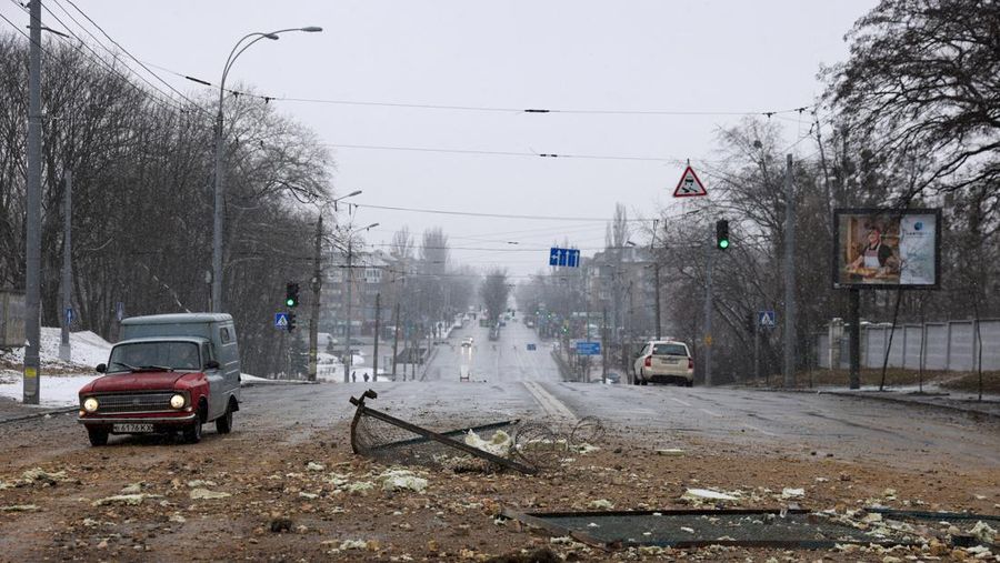 A resident drives through yesterday's blast site after an attack targeted the TV tower as Russia's invasion of Ukraine continues, in Kyiv, Ukraine March 2, 2022. REUTERS/Umit Bektas