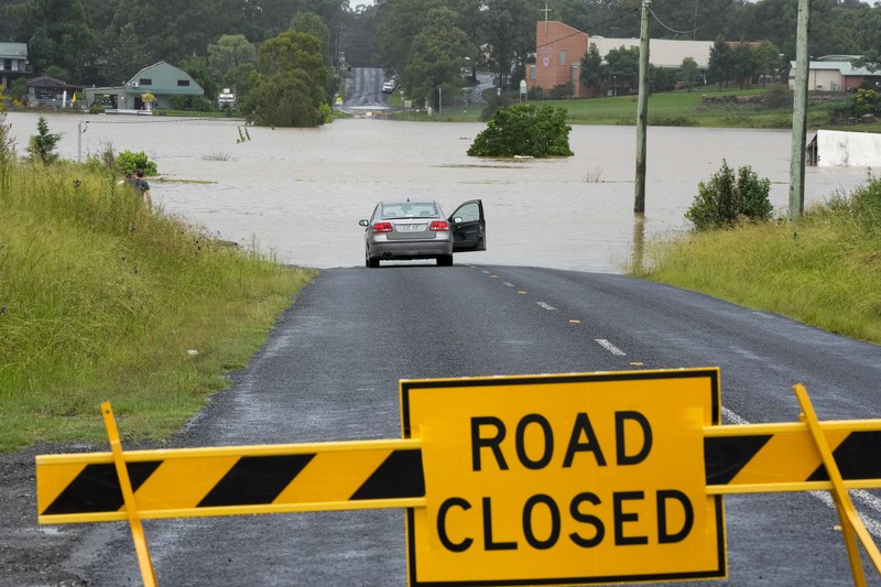 Australia Floods A building is submerged in flood waters near Windsor on the outskirts of Sydney, Australia, Thursday, March 3, 2022.Tens of thousands of people had been ordered to evacuate their homes and many more had been told to prepare to flee as parts of Australia's southeast coast are inundated by the worst flooding in decades. (AP Photo/Rick Rycroft)