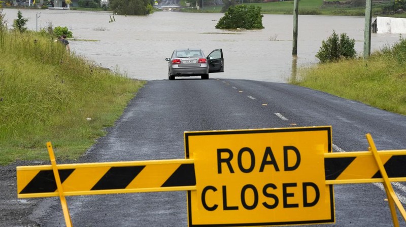 A building is submerged in flood waters near Windsor on the outskirts of Sydney, Australia, Thursday, March 3, 2022.Tens of thousands of people had been ordered to evacuate their homes and many more had been told to prepare to flee as parts of Australia's southeast coast are inundated by the worst flooding in decades. (AP Photo/Rick Rycroft)