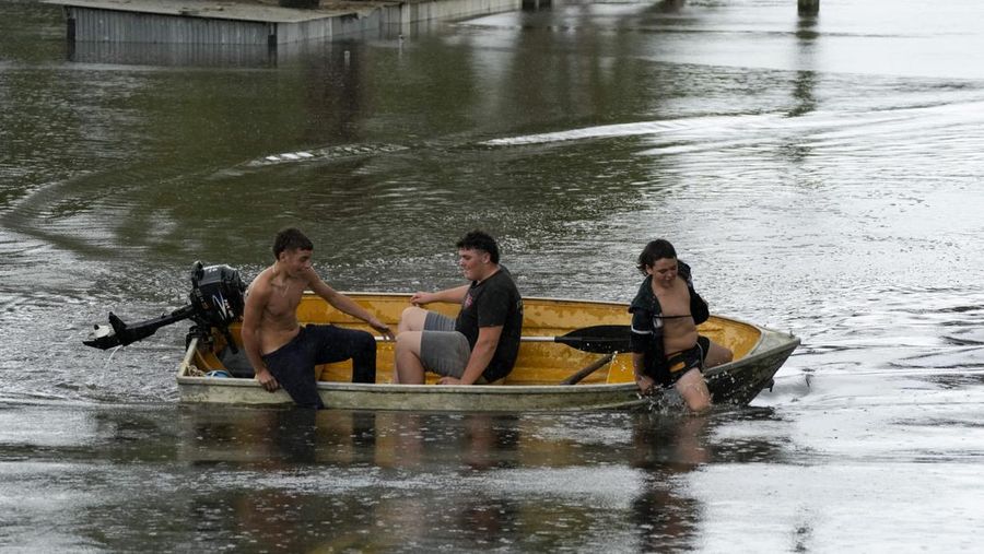 A building is submerged in flood waters near Windsor on the outskirts of Sydney, Australia, Thursday, March 3, 2022.Tens of thousands of people had been ordered to evacuate their homes and many more had been told to prepare to flee as parts of Australia's southeast coast are inundated by the worst flooding in decades. (AP Photo/Rick Rycroft)