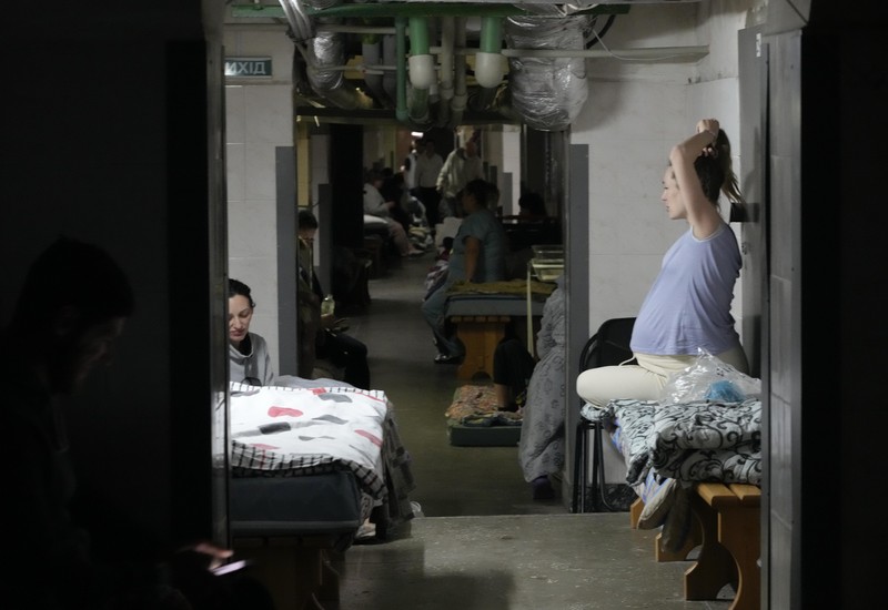 Russia Ukraine War Medical workers tend to women who gave birth in a basement of a maternity hospital converted into a medical ward and used as a bomb shelter in Mariupol, Ukraine, Tuesday, March 1, 2022. Russian strikes on the key southern port city of Mariupol seriously wounded several people. (AP Photo/Evgeniy Maloletka)