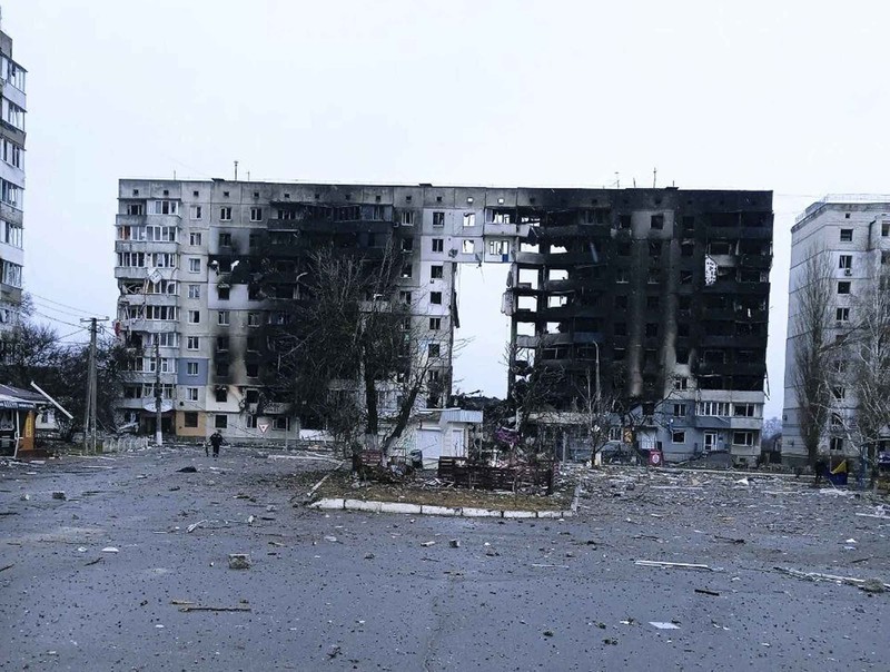 A building burns after shelling in Kyiv, Ukraine, Thursday, March 3, 2022. Russian forces have escalated their attacks on crowded cities in what Ukraine's leader called a blatant campaign of terror. (AP Photo/Efrem Lukatsky)