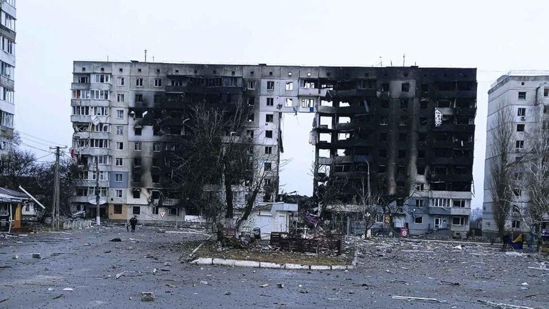 A building burns after shelling in Kyiv, Ukraine, Thursday, March 3, 2022. Russian forces have escalated their attacks on crowded cities in what Ukraine's leader called a blatant campaign of terror. (AP Photo/Efrem Lukatsky)