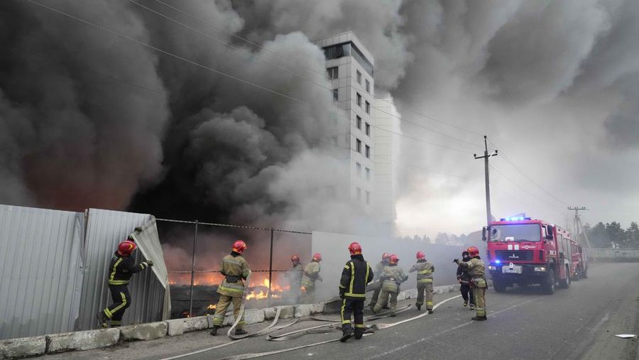A building burns after shelling in Kyiv, Ukraine, Thursday, March 3, 2022. Russian forces have escalated their attacks on crowded cities in what Ukraine's leader called a blatant campaign of terror. (AP Photo/Efrem Lukatsky)