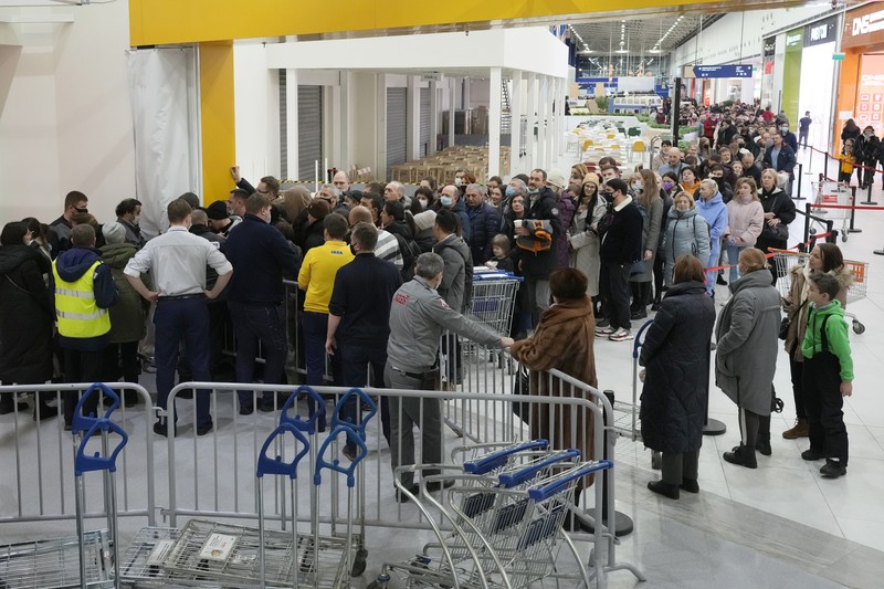 Russia Ukraine War Economy People wait in a line to enter the IKEA store at the outskirts of St. Petersburg, Russia, Thursday, March 3, 2022. IKEA is closing its stores and pausing all sourcing in Russia and Belarus from Friday, March 4.
