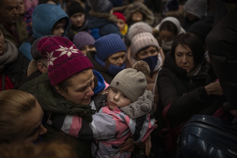 Russia Ukraine War Goodbyes Photo Gallery A couple says goodbye before she boards on a train bound for Lviv at the Kyiv station, Ukraine, Thursday, March 3. 2022. (AP Photo/Emilio Morenatti)