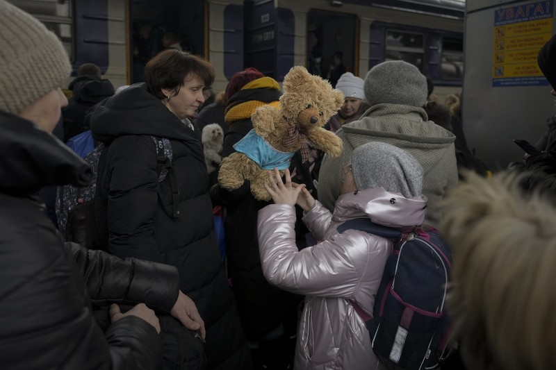Russia Ukraine War Goodbyes Photo Gallery A couple says goodbye before she boards on a train bound for Lviv at the Kyiv station, Ukraine, Thursday, March 3. 2022. (AP Photo/Emilio Morenatti)
