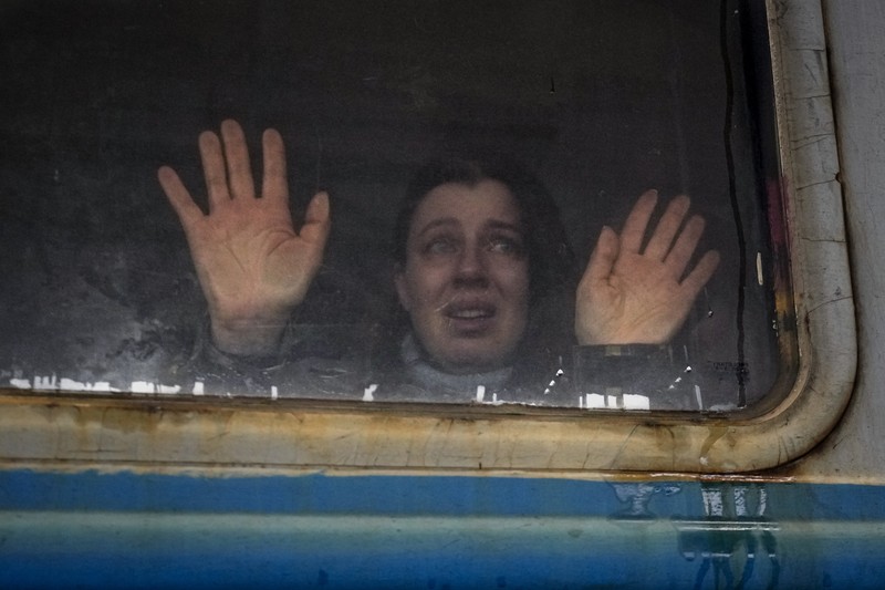 Russia Ukraine War Goodbyes Photo Gallery A couple says goodbye before she boards on a train bound for Lviv at the Kyiv station, Ukraine, Thursday, March 3. 2022. (AP Photo/Emilio Morenatti)