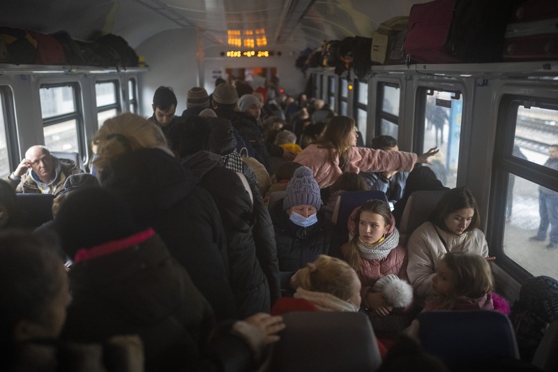 Russia Ukraine War Goodbyes Photo Gallery A couple says goodbye before she boards on a train bound for Lviv at the Kyiv station, Ukraine, Thursday, March 3. 2022. (AP Photo/Emilio Morenatti)