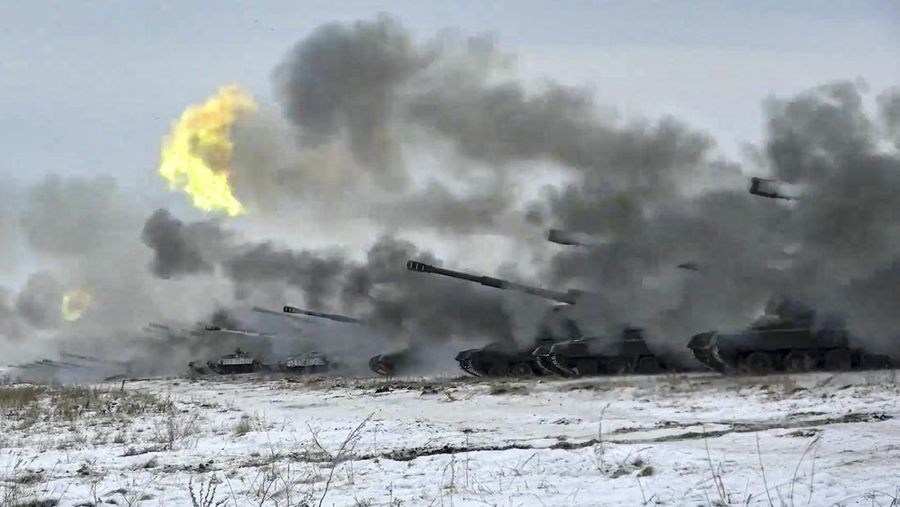 FILE - In this image taken from video and released by Russian Defense Ministry Press Service, Russian army's self-propelled howitzers fire during military drills near Orenburg in the Urals, Russia, Dec. 16, 2021. The Russian invasion of Ukraine is the largest conflict that Europe has seen since World War II, with Russia conducting a multi-pronged offensive across the country. The Russian military has pummeled wide areas in Ukraine with air strikes and has conducted massive rocket and artillery bombardment resulting in massive casualties. (Russian Defense Ministry Press Service via AP, File)