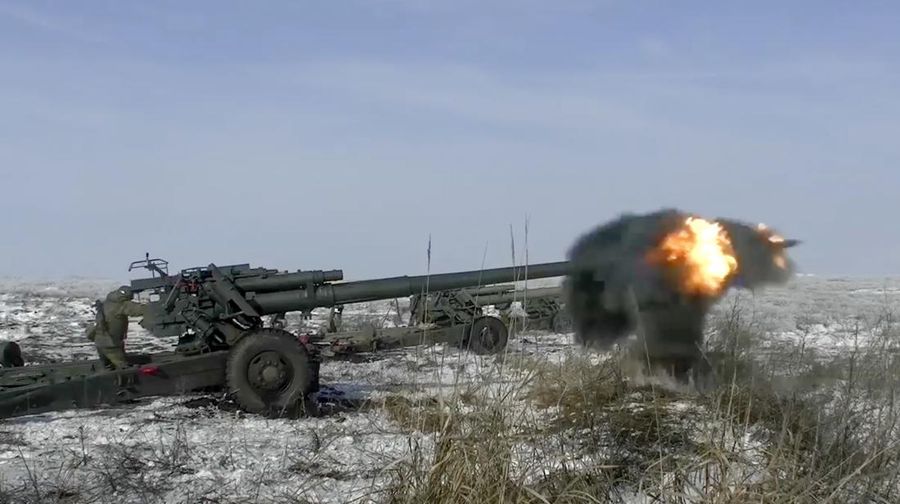 FILE - In this photo taken from video provided by the Russian Defense Ministry Press Service on Friday, Jan. 28, 2022, Russian troops fire howitzers during drills in the Rostov region during a military exercising at a training ground in Rostov region, Russia. The Russian invasion of Ukraine is the largest conflict that Europe has seen since World War II, with Russia conducting a multi-pronged offensive across the country. The Russian military has pummeled wide areas in Ukraine with air strikes and has conducted massive rocket and artillery bombardment resulting in massive casualties. (Russian Defense Ministry Press Service via AP, File)
