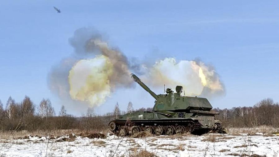 FILE - In this photo taken from video provided by the Russian Defense Ministry Press Service on Tuesday, Feb. 15, 2022, a self-propelled artillery mount fires at the Osipovichi training ground during the Union Courage-2022 Russia-Belarus military drills in Belarus. The Russian invasion of Ukraine is the largest conflict that Europe has seen since World War II, with Russia conducting a multi-pronged offensive across the country. The Russian military has pummeled wide areas in Ukraine with air strikes and has conducted massive rocket and artillery bombardment resulting in massive casualties. (Russian Defense Ministry Press Service via AP, File)