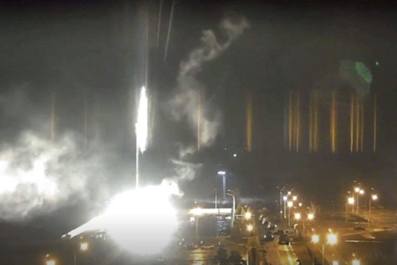 Ukraine Nuclear Plant This image made from a video released by Zaporizhzhia nuclear power plant shows bright flaring object landing in grounds of the nuclear plant in Enerhodar, Ukraine Friday, March 4, 2022. Russian forces shelled Europe’s largest nuclear plant early Friday, sparking a fire as they pressed their attack on a crucial energy-producing Ukrainian city and gained ground in their bid to cut off the country from the sea. (Zaporizhzhia nuclear power plant via AP)