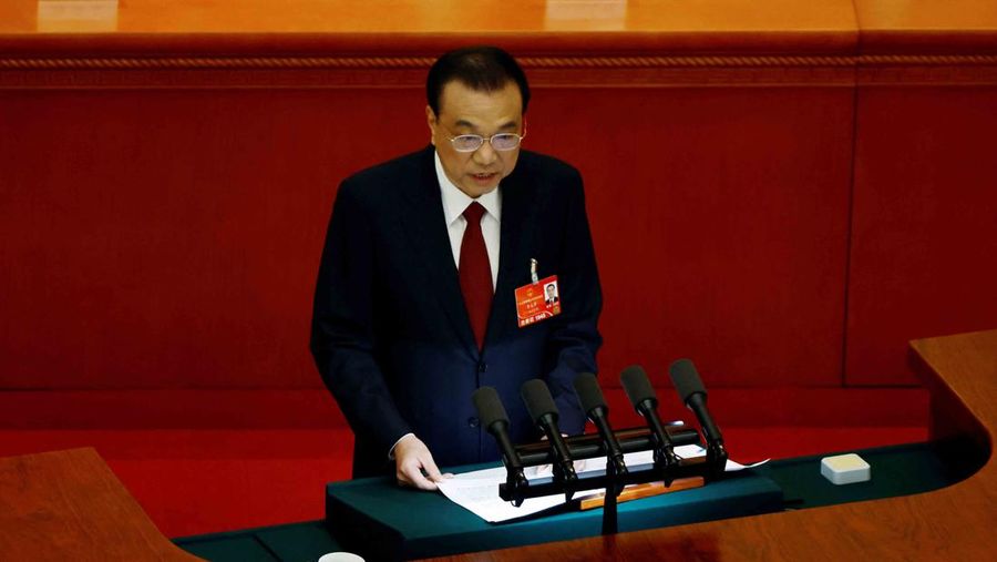 Chinese Premier Li Keqiang speaks at the opening session of the National People's Congress (NPC) at the Great Hall of the People in Beijing, China March 5, 2022. REUTERS/Carlos Garcia Rawlins