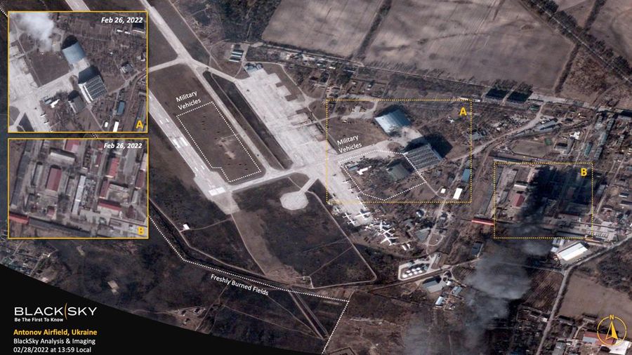 A satellite image collected over Antonov Airfield shows the destroyed former hangar of the Antonov An-225 Mriya sitting north of military vehicles clustered around main hangars and a static aircraft to south, as well as nearby warehouses now engulfed in flames as conflict continues in the area, Ukraine February 28, 2022.  BLACKSKY/Handout via REUTERS  THIS IMAGE HAS BEEN SUPPLIED BY A THIRD PARTY. MANDATORY CREDIT. NO RESALES. NO ARCHIVES. DO NOT OBSCURE LOGO