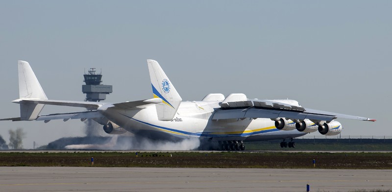 A satellite image collected over Antonov Airfield shows the destroyed former hangar of the Antonov An-225 Mriya sitting north of military vehicles clustered around main hangars and a static aircraft to south, as well as nearby warehouses now engulfed in flames as conflict continues in the area, Ukraine February 28, 2022.  BLACKSKY/Handout via REUTERS  THIS IMAGE HAS BEEN SUPPLIED BY A THIRD PARTY. MANDATORY CREDIT. NO RESALES. NO ARCHIVES. DO NOT OBSCURE LOGO