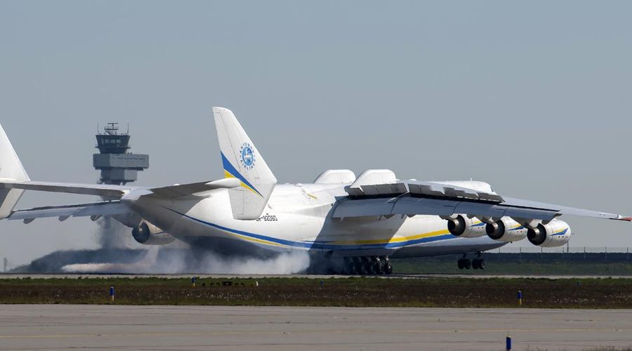 A satellite image collected over Antonov Airfield shows the destroyed former hangar of the Antonov An-225 Mriya sitting north of military vehicles clustered around main hangars and a static aircraft to south, as well as nearby warehouses now engulfed in flames as conflict continues in the area, Ukraine February 28, 2022.  BLACKSKY/Handout via REUTERS  THIS IMAGE HAS BEEN SUPPLIED BY A THIRD PARTY. MANDATORY CREDIT. NO RESALES. NO ARCHIVES. DO NOT OBSCURE LOGO