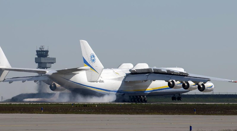 A satellite image collected over Antonov Airfield shows the destroyed former hangar of the Antonov An-225 Mriya sitting north of military vehicles clustered around main hangars and a static aircraft to south, as well as nearby warehouses now engulfed in flames as conflict continues in the area, Ukraine February 28, 2022.  BLACKSKY/Handout via REUTERS  THIS IMAGE HAS BEEN SUPPLIED BY A THIRD PARTY. MANDATORY CREDIT. NO RESALES. NO ARCHIVES. DO NOT OBSCURE LOGO