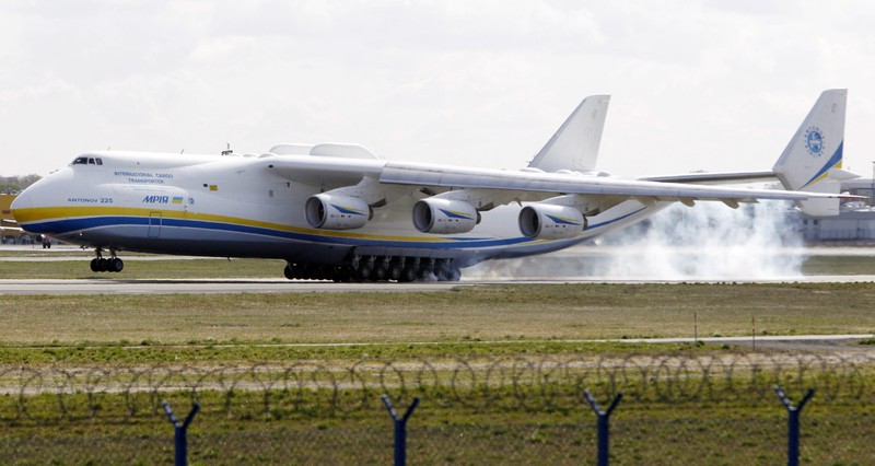 A satellite image collected over Antonov Airfield shows the destroyed former hangar of the Antonov An-225 Mriya sitting north of military vehicles clustered around main hangars and a static aircraft to south, as well as nearby warehouses now engulfed in flames as conflict continues in the area, Ukraine February 28, 2022.  BLACKSKY/Handout via REUTERS  THIS IMAGE HAS BEEN SUPPLIED BY A THIRD PARTY. MANDATORY CREDIT. NO RESALES. NO ARCHIVES. DO NOT OBSCURE LOGO