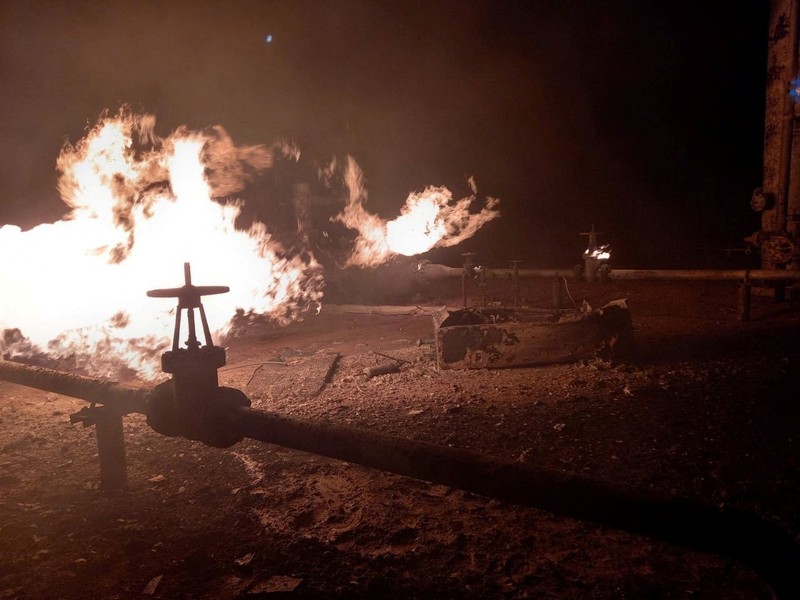 UKRAINE-CRISIS/ Facilities of a complex that prepares natural gas for transportation are pictured in a fire after night shelling, as Russia's attack on Ukraine continues, in the village of Hlazunivka in Kharkiv region, Ukraine, in this handout picture released March 13, 2022. Press service of the State Emergency Service of Ukraine/Handout via REUTERS ATTENTION EDITORS - THIS IMAGE HAS BEEN SUPPLIED BY A THIRD PARTY. MANDATORY CREDIT.