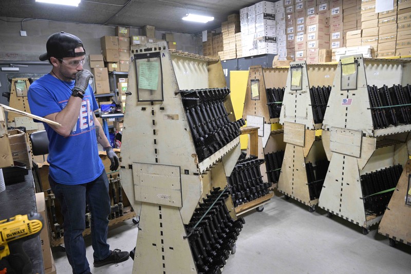 Russia Ukraine War Americans Giving Guns Adrian Kellgren, director of industrial production of KelTec, holds a 9mm SUB2000 rifle, similar to ones being shipped to Ukraine, at their manufacturing facility on Thursday, March 17, 2022, in Cocoa, Fla. Kellgren’s family-owned gun company was left holding a $200,000 shipment of semi-automatic rifles after a longtime customer in Odessa suddenly went silent during Vladimir Putin’s invasion of Ukraine. Fearing the worst, the company decided to put those stranded 400 guns to good use, sending them to Ukraine's nascent resistance movement. (AP Photo/Phelan M. Ebenhack)