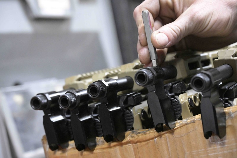 Russia Ukraine War Americans Giving Guns Adrian Kellgren, director of industrial production of KelTec, holds a 9mm SUB2000 rifle, similar to ones being shipped to Ukraine, at their manufacturing facility on Thursday, March 17, 2022, in Cocoa, Fla. Kellgren’s family-owned gun company was left holding a $200,000 shipment of semi-automatic rifles after a longtime customer in Odessa suddenly went silent during Vladimir Putin’s invasion of Ukraine. Fearing the worst, the company decided to put those stranded 400 guns to good use, sending them to Ukraine's nascent resistance movement. (AP Photo/Phelan M. Ebenhack)