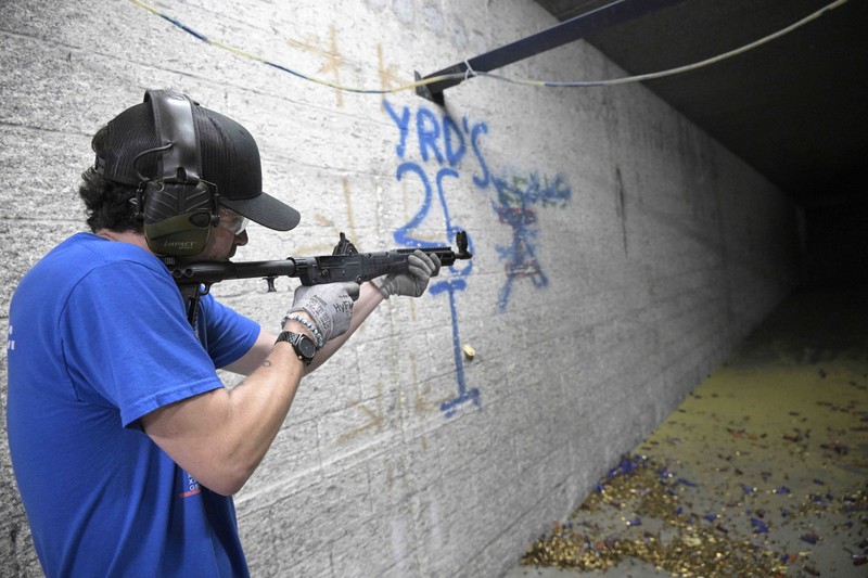 Russia Ukraine War Americans Giving Guns Adrian Kellgren, director of industrial production of KelTec, holds a 9mm SUB2000 rifle, similar to ones being shipped to Ukraine, at their manufacturing facility on Thursday, March 17, 2022, in Cocoa, Fla. Kellgren’s family-owned gun company was left holding a $200,000 shipment of semi-automatic rifles after a longtime customer in Odessa suddenly went silent during Vladimir Putin’s invasion of Ukraine. Fearing the worst, the company decided to put those stranded 400 guns to good use, sending them to Ukraine's nascent resistance movement. (AP Photo/Phelan M. Ebenhack)