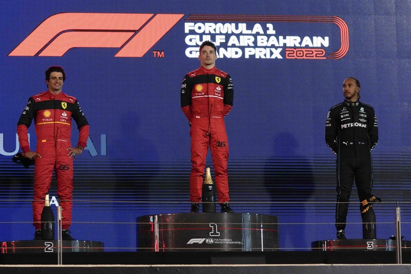 Ferrari driver Charles Leclerc of Monaco celebrates after he won the Formula One Bahrain Grand Prix it in Sakhir, Bahrain, Sunday, March 20, 2022. (AP Photo/Hassan Ammar)