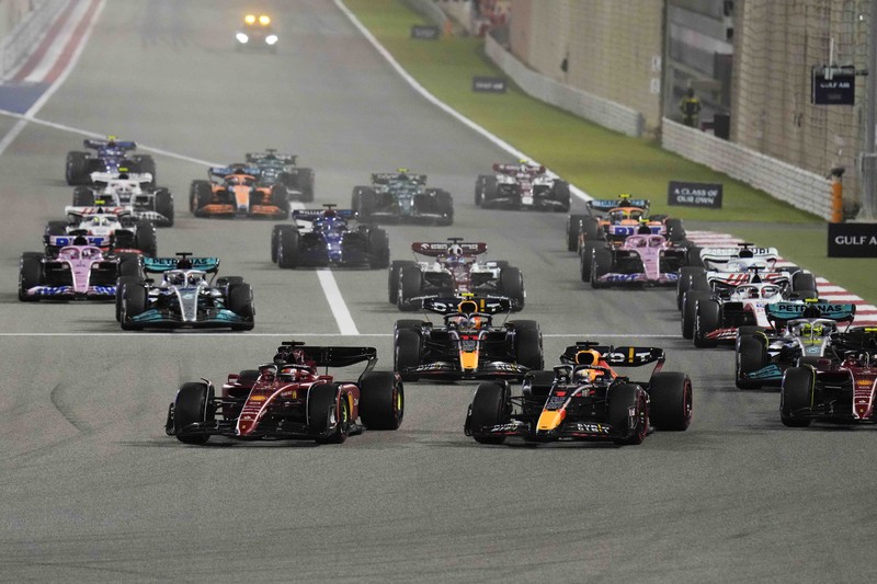 Ferrari driver Charles Leclerc of Monaco celebrates after he won the Formula One Bahrain Grand Prix it in Sakhir, Bahrain, Sunday, March 20, 2022. (AP Photo/Hassan Ammar)