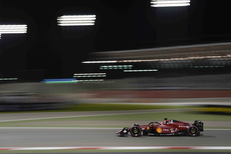 Bahrain F1 GP Auto Racing Ferrari driver Charles Leclerc of Monaco celebrates after he won the Formula One Bahrain Grand Prix it in Sakhir, Bahrain, Sunday, March 20, 2022. (AP Photo/Hassan Ammar)