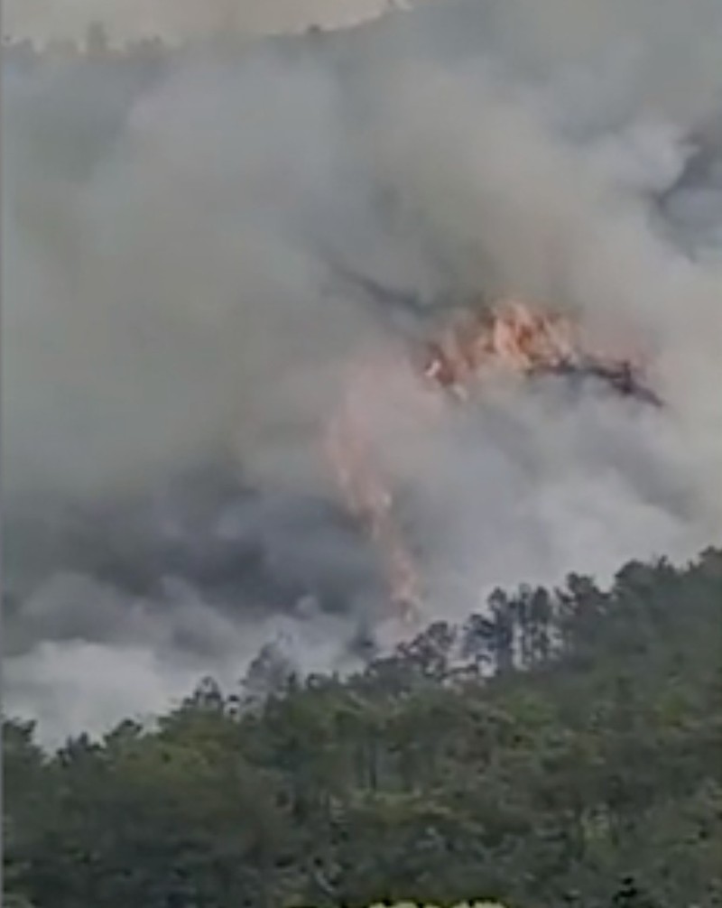 In this image taken from video footage run by China's CCTV, emergency personnel prepare to travel to the site of a plane crash near Wuzhou in southwestern China's Guangxi Zhuang Autonomous Region, Monday, March 21, 2022. A China Eastern Boeing 737-800 with more than 100 people on board crashed in the southern province of Guangxi on Monday, officials said. (CCTV via AP)