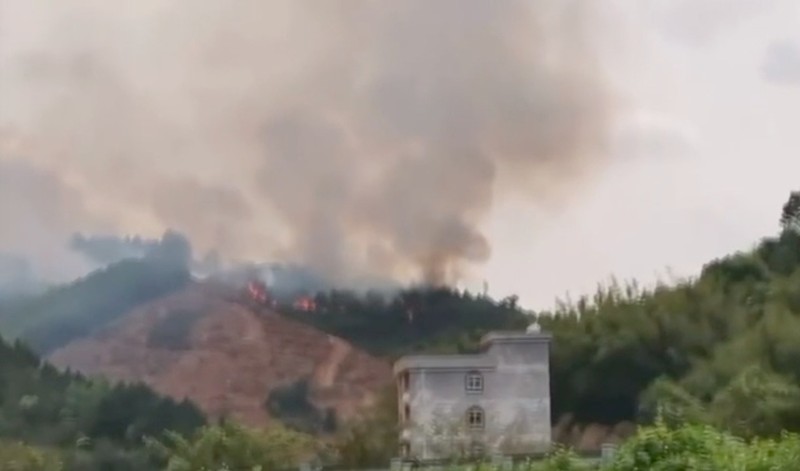 In this image taken from video footage run by China's CCTV, emergency personnel prepare to travel to the site of a plane crash near Wuzhou in southwestern China's Guangxi Zhuang Autonomous Region, Monday, March 21, 2022. A China Eastern Boeing 737-800 with more than 100 people on board crashed in the southern province of Guangxi on Monday, officials said. (CCTV via AP)