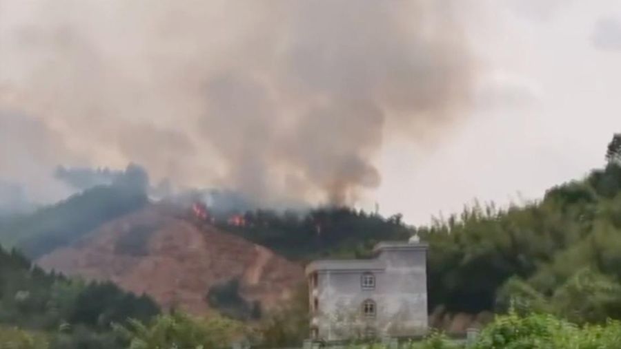 In this image taken from video footage run by China's CCTV, emergency personnel prepare to travel to the site of a plane crash near Wuzhou in southwestern China's Guangxi Zhuang Autonomous Region, Monday, March 21, 2022. A China Eastern Boeing 737-800 with more than 100 people on board crashed in the southern province of Guangxi on Monday, officials said. (CCTV via AP)