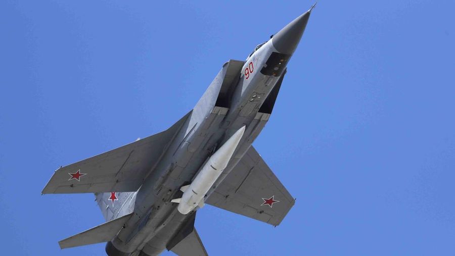 A Russian Air Force MiG-31K jet carries a high-precision hypersonic aero-ballistic missile Kh-47M2 Kinzhal during the Victory Day military parade to celebrate 73 years since the end of WWII and the defeat of Nazi Germany, in Moscow, Russia, Wednesday, May 9, 2018. (AP Photo/Pavel Golovkin)