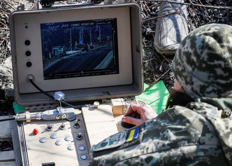 UKRAINE-CRISIS/FRONTLINE-FEMALE FIGHTER Tetiana Chornovol, former member of the Ukrainian Parliament, service member and operator of an anti-tank guided missile weapon system is pictured at a position on the front line, amid Russia's invasion of Ukraine, in the Kyiv region, Ukraine March 20, 2022. REUTERS/Gleb Garanich