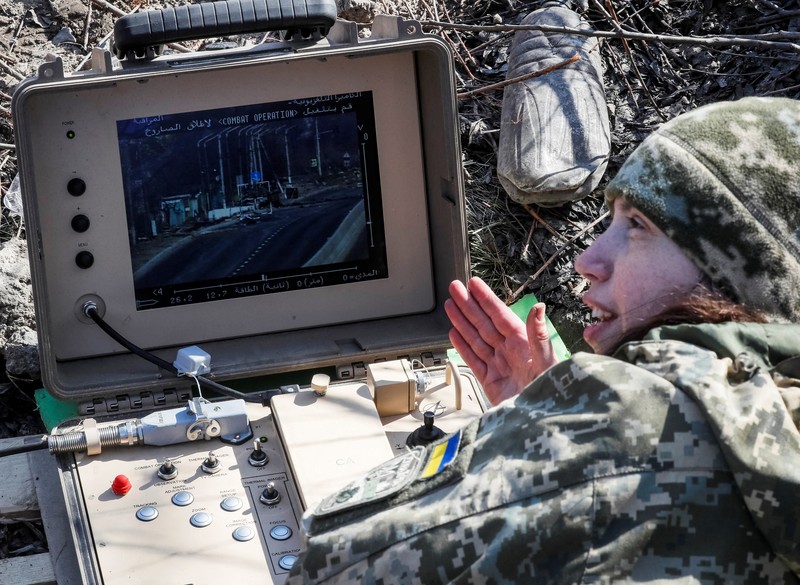 UKRAINE-CRISIS/FRONTLINE-FEMALE FIGHTER Tetiana Chornovol, former member of the Ukrainian Parliament, service member and operator of an anti-tank guided missile weapon system is pictured at a position on the front line, amid Russia's invasion of Ukraine, in the Kyiv region, Ukraine March 20, 2022. REUTERS/Gleb Garanich