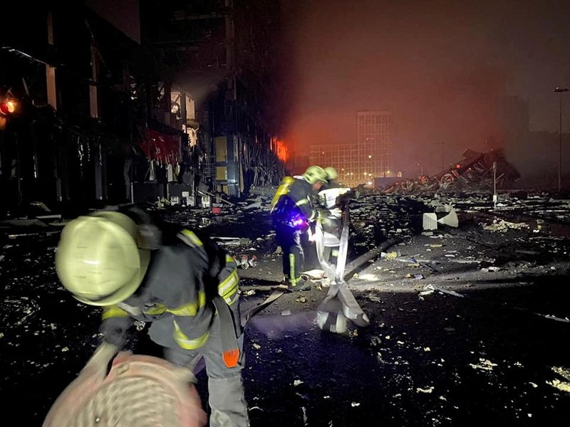 UKRAINE-CRISIS/KYIV-BLASTS Fire burns after a blast hits a shopping centre, in Kyiv, Ukraine, in this still image obtained from a handout video released on March 20, 2022. State Emergency Service of Ukraine/Handout via REUTERS ATTENTION EDITORS - THIS IMAGE HAS BEEN SUPPLIED BY A THIRD PARTY. MANDATORY CREDIT. NO RESALES. NO ARCHIVES