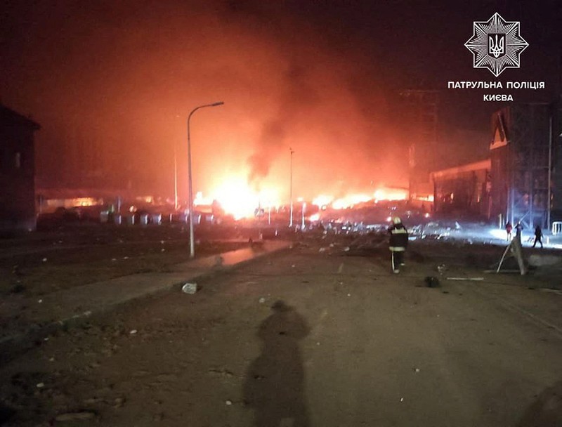 UKRAINE-CRISIS/KYIV-BLASTS Fire burns after a blast hits a shopping centre, in Kyiv, Ukraine, in this still image obtained from a handout video released on March 20, 2022. State Emergency Service of Ukraine/Handout via REUTERS ATTENTION EDITORS - THIS IMAGE HAS BEEN SUPPLIED BY A THIRD PARTY. MANDATORY CREDIT. NO RESALES. NO ARCHIVES