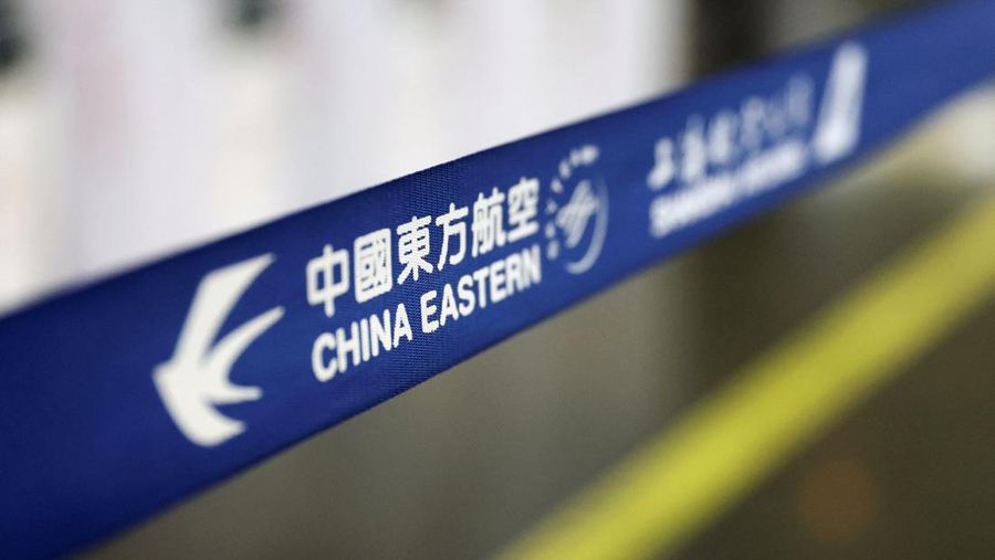 The logo of China Eastern Airlines is pictured at Beijing Capital International Airport in Beijing, China March 21, 2022. REUTERS/Tingshu Wang