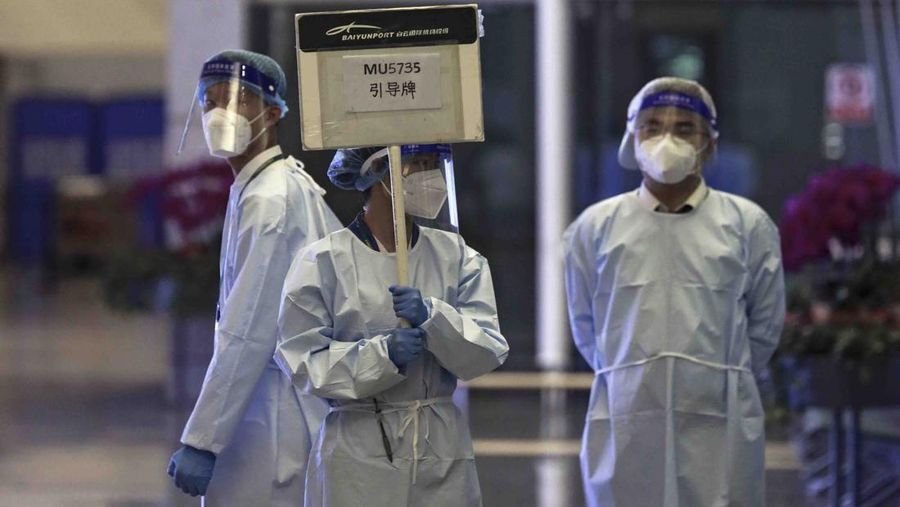 In this photo taken by mobile phone released by Xinhua News Agency, a piece of wreckage of the China Eastern's flight MU5735 are seen after it crashed on the mountain in Tengxian County, south China's Guangxi Zhuang Autonomous Region on Monday, March 21, 2022. A China Eastern Boeing 737-800 with 132 people on board crashed in a remote mountainous area of southern China on Monday, officials said, setting off a forest fire visible from space in the country's worst air disaster in nearly a decade. (Xinhua via AP)