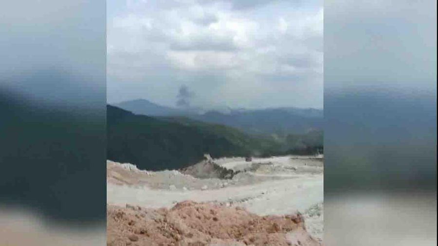 In this photo taken by mobile phone released by Xinhua News Agency, a piece of wreckage of the China Eastern's flight MU5735 are seen after it crashed on the mountain in Tengxian County, south China's Guangxi Zhuang Autonomous Region on Monday, March 21, 2022. A China Eastern Boeing 737-800 with 132 people on board crashed in a remote mountainous area of southern China on Monday, officials said, setting off a forest fire visible from space in the country's worst air disaster in nearly a decade. (Xinhua via AP)