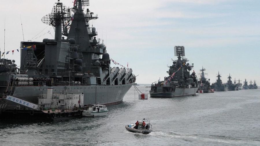 FILE PHOTO: Russian Navy vessels are anchored in a bay of the Black Sea port of Sevastopol in Crimea May 8, 2014.  REUTERS/Stringer/File Photo