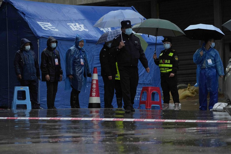 China Plane Crash In this photo released by Xinhua News Agency, rescue workers search for the black boxes at a plane crash site in Tengxian county, southwestern China's Guangxi Zhuang Autonomous Region, Tuesday, March 22, 2022. A China Eastern flight 5735 carrying 123 passengers and nine crew members crashed outside the city of Wuzhou in the Guangxi region while flying from Kunming, the capital of the southwestern province of Yunnan, to Guangzhou, an industrial center not far from Hong Kong on China's southeastern coast. It ignited a fire big enough to be seen on NASA satellite images before firefighters could extinguished it. (Zhou Hua/Xinhua via AP)